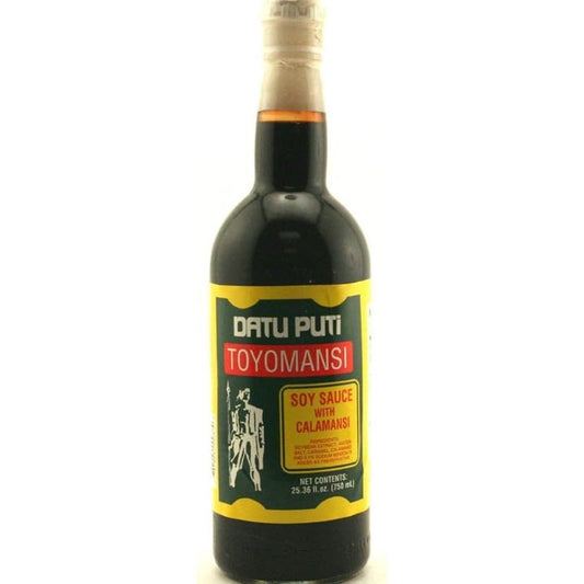 Bottle of Datu Puti Toyomansi soy sauce with calamansi on a white background